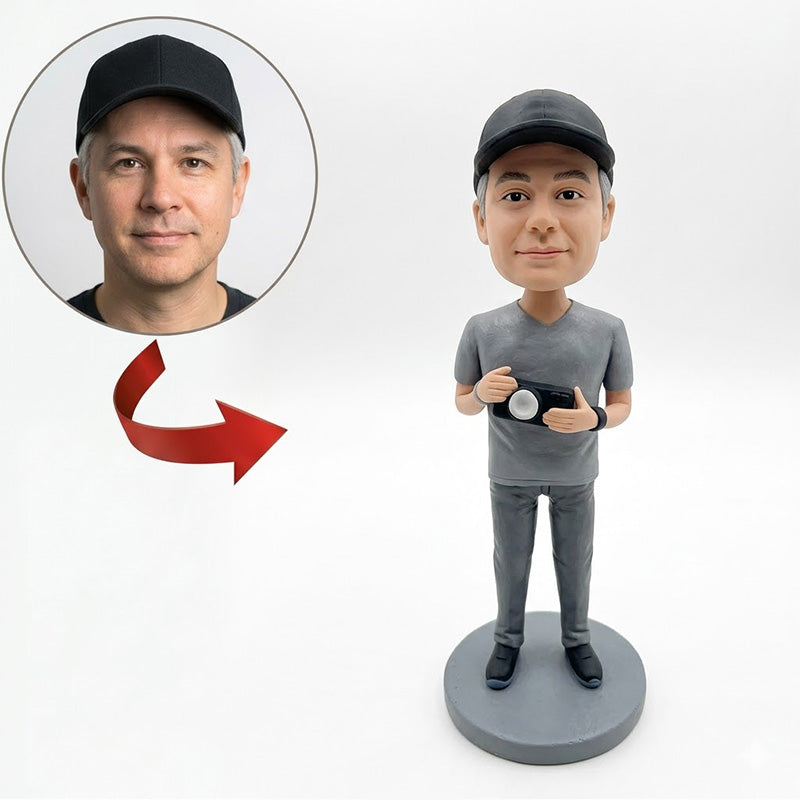 Custom Photographer Bobblehead from Photo – Personalized Man Holding Camera in Grey Shirt & Black Cap | Handmade Gift for Photography Lover - ForeverBobble